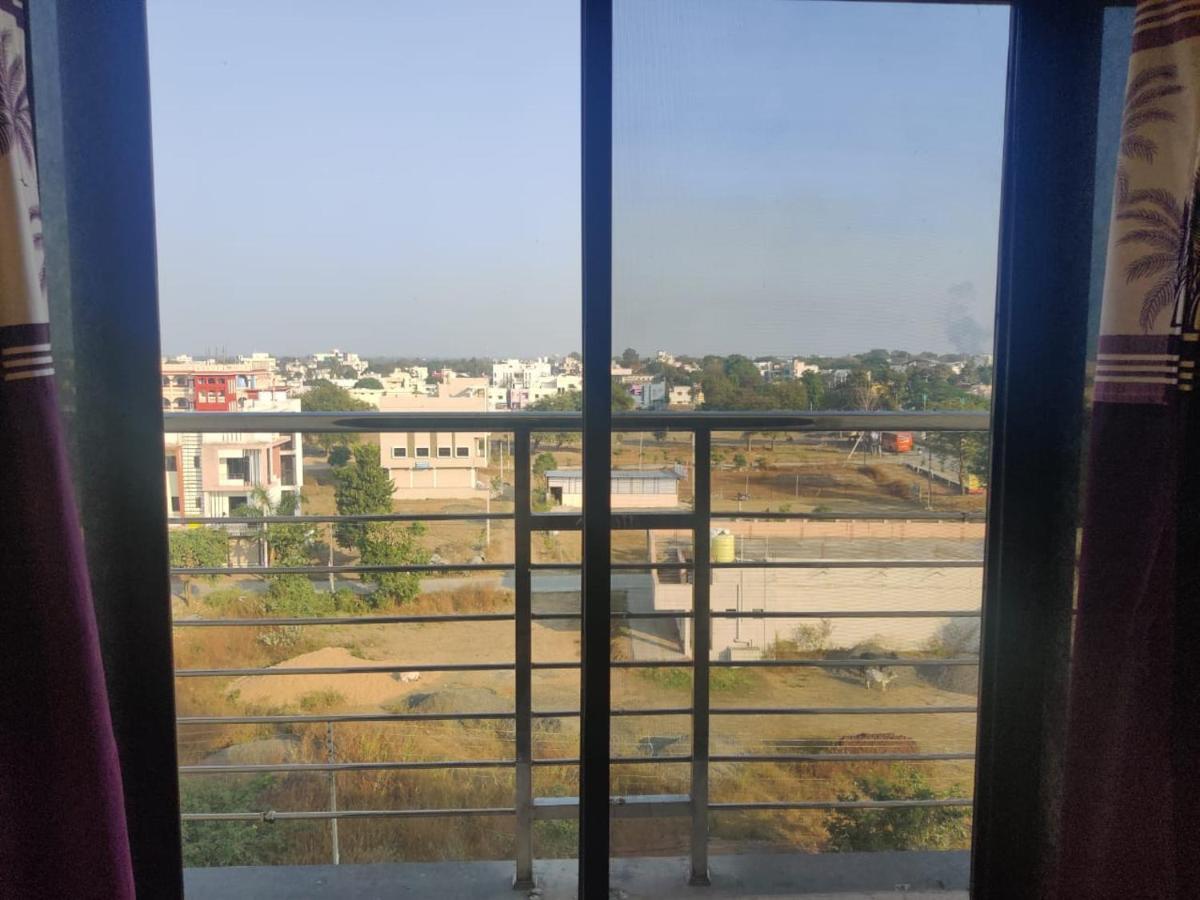 Hotel Hariram Tower Wardha Rum bild